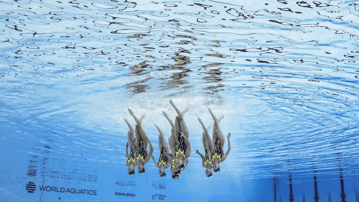 Artistic Swimming - World Aquatics Championships - Aspire Dome, Doha, Qatar - February 5, 2024  Canada perform during the team technical preliminary round REUTERS/Clodagh Kilcoyne
