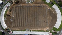 Foto udara sejumlah pekerja melakukan renovasi Stadion Gelora Kie Raha di Kota Ternate, Maluku Utara, Rabu (7/1/2024).