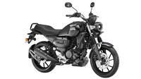 Secara tampilan Yamaha FZ-X Chrome menampilkan nuansa retro yang cukup kuat. Hal tersebut bisa terlihat melalui model lampu utama yang membulat sempurna, sepasang sein bertungkai yang dibuat menggantung, tangki model teardrop, dudukan dengan motif garis dan tambahan tungkai besi di area ekor. Foto: Yamaha India.