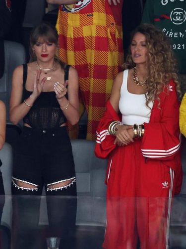 LAS VEGAS, NEVADA - FEBRUARY 11: Singer Taylor Swift and Actress Blake Lively react prior to Super Bowl LVIII between the San Francisco 49ers and Kansas City Chiefs at Allegiant Stadium on February 11, 2024 in Las Vegas, Nevada. (Photo by Rob Carr/Getty Images)