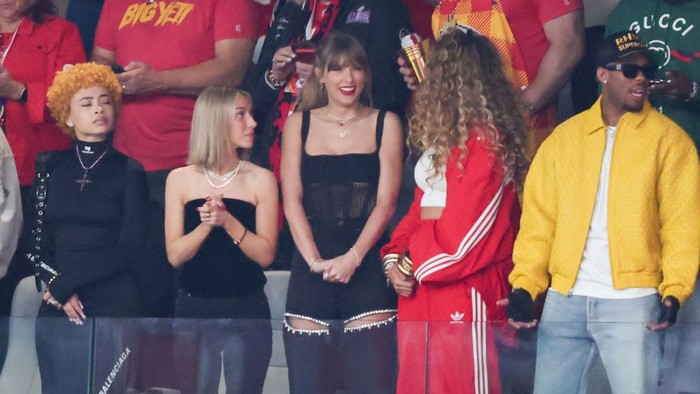 LAS VEGAS, NEVADA - FEBRUARY 11: Singer Taylor Swift and Actress Blake Lively react prior to Super Bowl LVIII between the San Francisco 49ers and Kansas City Chiefs at Allegiant Stadium on February 11, 2024 in Las Vegas, Nevada. (Photo by Rob Carr/Getty Images)