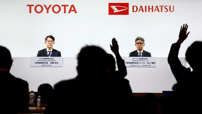 Daihatsu Motor Co.'s next President Masahiro Inoue attends a joint press conference with Toyota Motor Corp. President Koji Sato (not in picture) as reporters raise their hands for questions in Tokyo, Japan February 13, 2024.  REUTERS/Issei Kato