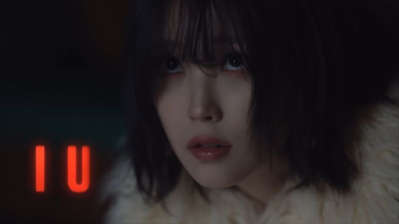 Adegan dalam teaser video lagu 'Shh..' IU. Video ini menampilkan IU bersama aktris China Tang Wei.