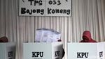 Hujan Tak Menyurutkan Antusias Warga Memilih Presiden