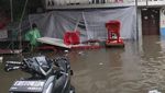 Penampakan TPS di Jakarta Kebanjiran saat Hari Pencoblosan