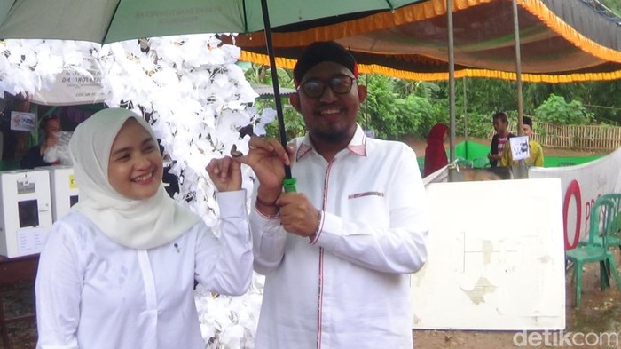 Pencoblosan di TPU tempat Bupati Fauzi memiliih sempat terhenti gegara hujan