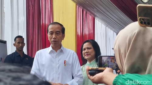 Presiden Jokowi dan Ibu Negara Iriana. (Eva Safitri/detikcom).