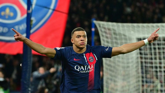 PARIS, FRANCE - FEBRUARY 14Kylian Mbappe of PSG celebrates after scoring his teams first goal during the UEFA Champions League 2023/24 round of 16 first leg match between Paris Saint-Germain and Real Sociedad at Parc des Princes on February 14, 2024 in Paris, France. (Photo by Christian Liewig - Corbis/Getty Images)