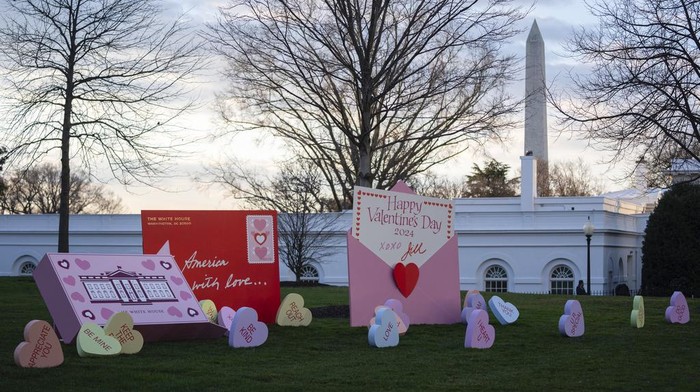 Decorations for Valentine's Day adorn the White House lawn, Wednesday, Feb. 14, 2024, in Washington. (AP Photo/Evan Vucci)