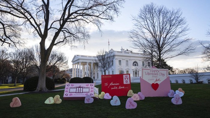 Decorations for Valentine's Day adorn the White House lawn, Wednesday, Feb. 14, 2024, in Washington. (AP Photo/Evan Vucci)