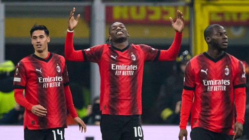 MILAN, ITALY - FEBRUARY 15: Rafael Leão of AC Milan (C) celebrates his goal during the UEFA Europa League 2023/24 round of 16 first leg match between AC Milan and Stade Rennais FC at Stadio Giuseppe Meazza on February 15, 2024 in Milan, Italy. (Photo by Marcio Machado/Eurasia Sport Images/Getty Images)