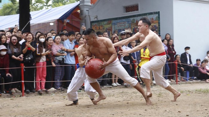 Villagers attend a traditional 