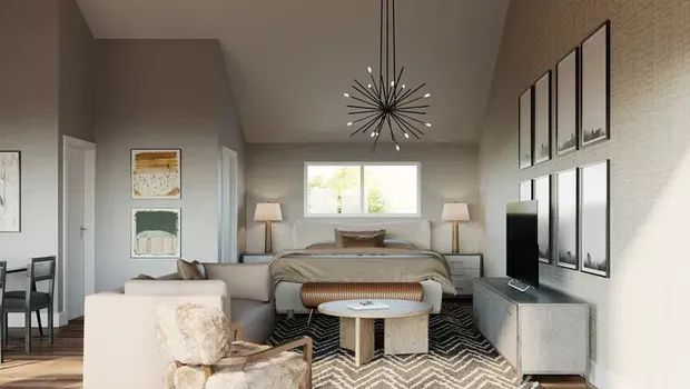 TV di kamar tidur/Nile Johnson Interior Design via The Spruce