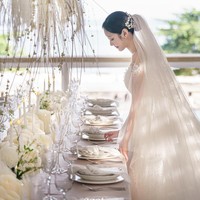 Begini potret cantik Mimi atau Jung Mi Mi ketika mengenakan gaun pengantin putih. Foto: Instagram @hiptriever