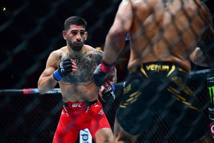 Feb 17, 2024; Anaheim, California, USA; Ilia Topuria fights against Alexander Volkanovski during UFC 298 at Honda Center. Mandatory Credit: Gary A. Vasquez-USA TODAY Sports