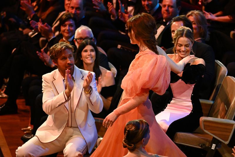 LONDON, ENGLAND - FEBRUARY 18: Emma Stone accepts the Leading Actress Award for 'Poor Things' during the 2024 EE BAFTA Film Awards, held at the Royal Festival Hall on February 18, 2024 in London, England. (Photo by Joe Maher/BAFTA/Getty Images for BAFTA)