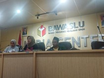 Migrant Care Temukan Lokasi Coblosan di Malaysia Berspanduk Caleg NasDem