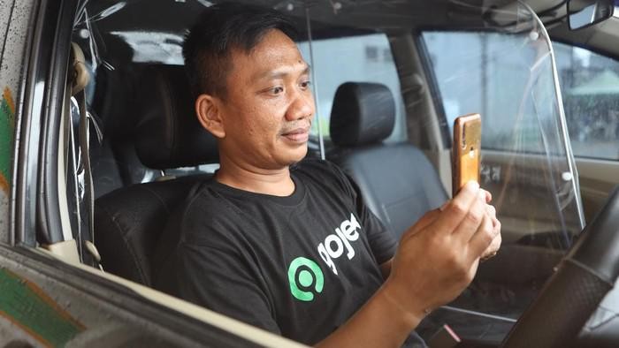 Ilustrasi verifikasi wajah di aplikasi mitra driver Gojek