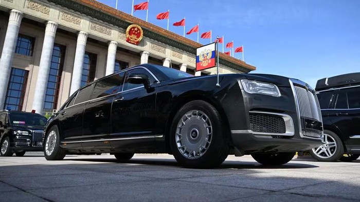 An Aurus limousine of Russian President Vladimir Putins motorcade is parked outside the Great Hall of the People during the Belt and Road Forum in Beijing, China, October 18, 2023. Sputnik/Dmitry Azarov/Pool via REUTERS/File Photo Purchase Licensing Rights