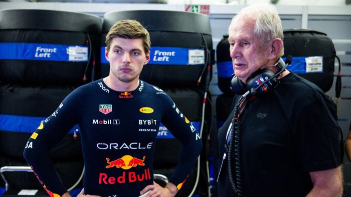 BAHRAIN, BAHRAIN - FEBRUARY 21: Max Verstappen of the Netherlands and Oracle Red Bull Racing talks with Red Bull Racing Team Consultant Dr Helmut Marko in the garage during day one of F1 Testing at Bahrain International Circuit on February 21, 2024 in Bahrain, Bahrain. (Photo by Mark Thompson/Getty Images)