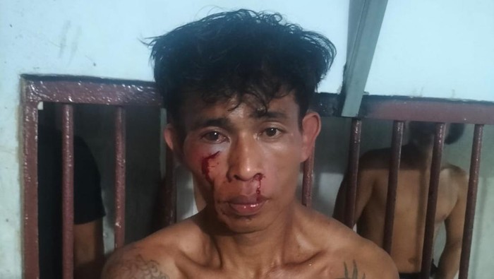 Pria pelaku penyiraman air keras terhadap mantan istrinya di Makassar.
