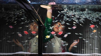 Xiaomi 14 Ultra turut dibekali sensor kamera IMX858 50MP dengan aperture f/1.8, focal length 75mm dan zoom optik 3,2x. Foto: Xiaomi