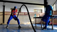 Reuters memperoleh akses yang tidak biasa ke fasilitas El Wajay, yang terdiri dari bangunan satu lantai yang menampung beberapa arena latihan, museum piala, lapangan basket, asrama balok beton sederhana, dan bahkan kebun pisang kecil untuk membantu memberi makan para atlet yang tinggal di sana.  