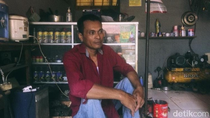 Amiin pemilik bengkel modifikasi motor roda tiga untuk disabilitas.