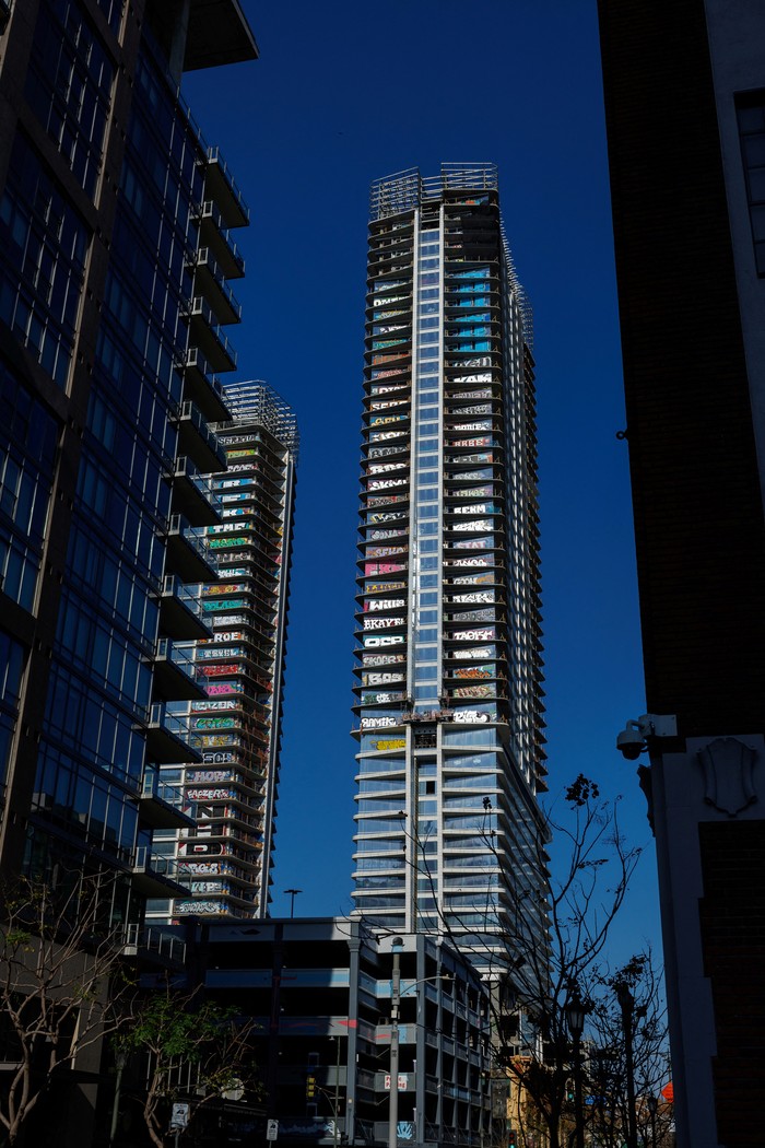 A view of one of the unfinished high-rise towers in downtown that have attracted graffiti artists after the developer ran out of money in Los Angeles, California, U.S., February 22, 2024.  REUTERS/Mike Blake