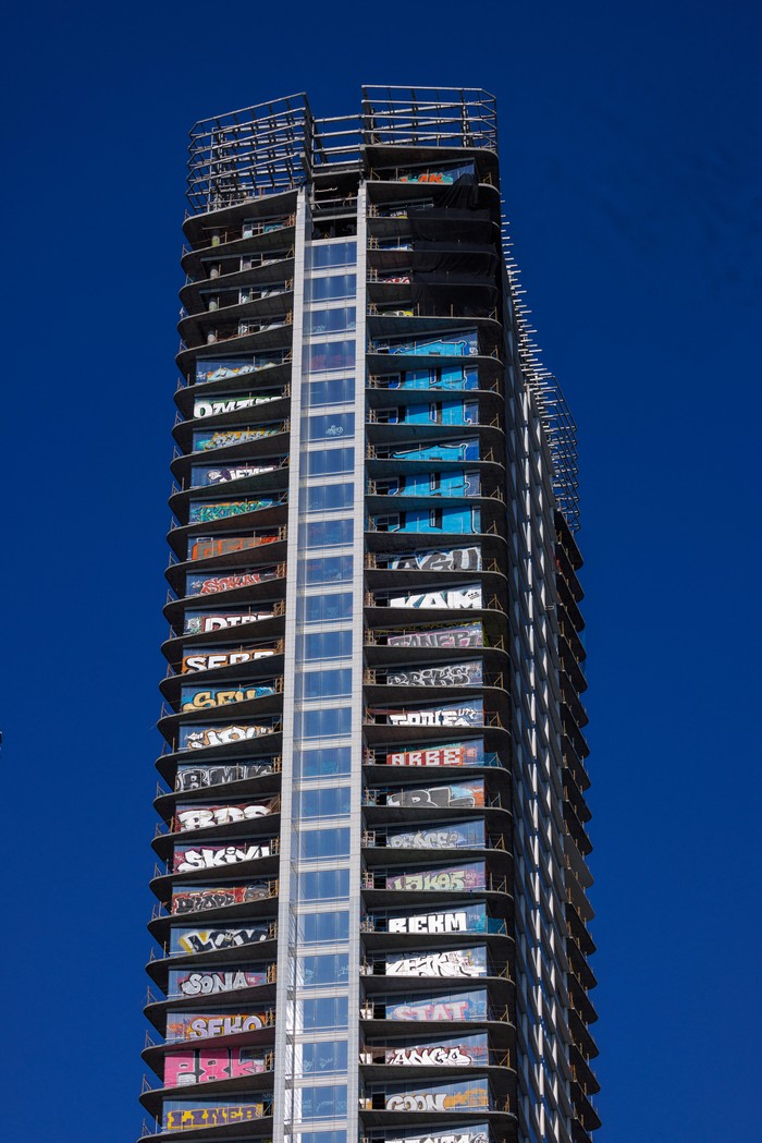 A view of one of the unfinished high-rise towers in downtown that have attracted graffiti artists after the developer ran out of money in Los Angeles, California, U.S., February 22, 2024.  REUTERS/Mike Blake