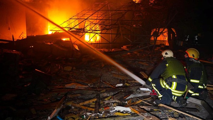 Rescuers work at a site of a Russian drone strike, amid Russia's attack on Ukraine, in a location given as Odesa, Ukraine, in this screengrab from a handout video released on February 23, 2024. Press service of the State Emergency Service of Ukraine in Odesa region/Handout via REUTERS ATTENTION EDITORS - THIS IMAGE HAS BEEN SUPPLIED BY A THIRD PARTY. MANDATORY CREDIT