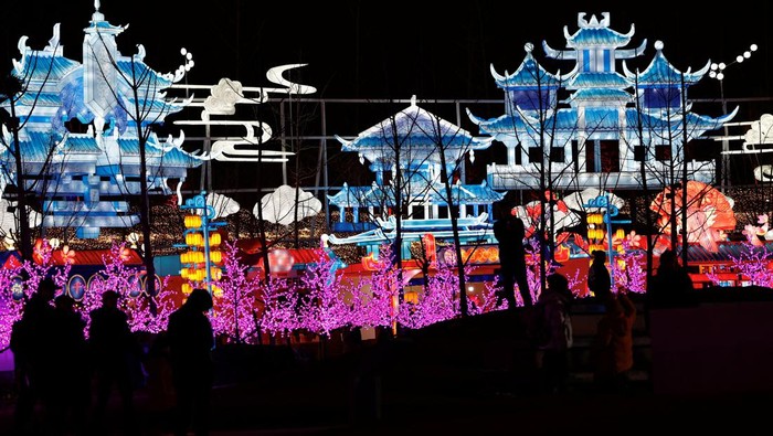 People enjoy light installations at a park on Lantern Festival, which marks the end of the Lunar New Year celebrations, in Beijing, China February, 24, 2024. REUTERS/Tingshu Wang