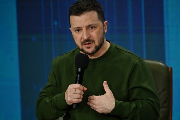 Ukraines President Volodymyr Zelensky attends a press conference during the 