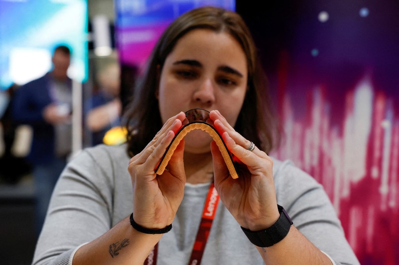 Visitors interact with latest technology, as they attend the Mobile World Congress (MWC) in Barcelona, Spain February 27, 2024. REUTERS/Bruna Casas