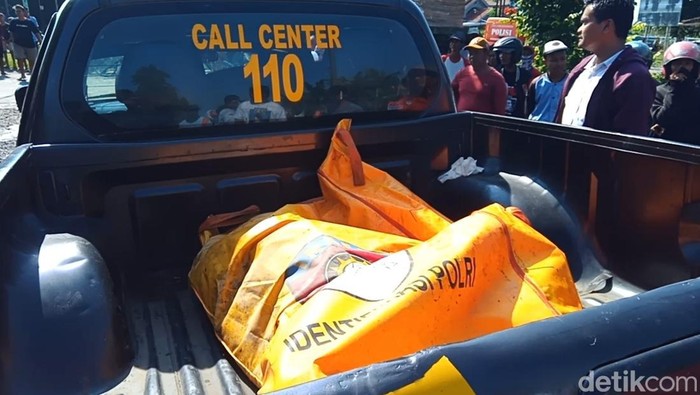 Mayat dalam kantung dan irigasi tempat penemuan mayat, Selasa (27/2/2024).