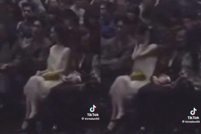 Pasangan itu tampak seru mengobrol di dalam venue fashion show Prada. Sampai-sampai Karina aespa tampak ketakutan dan menutupi kedua telinganya dengan tangan. Foto: Instagram