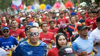 Ribuan peserta lari saat mengikuti ajang kompetisi lari yang juga digelar BTN di Jakarta baru-baru ini.