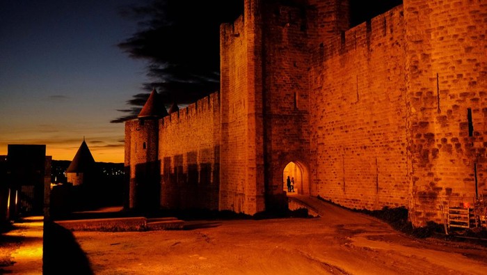 Tourists walk inside the Cite de Carcassonne, which is a medieval citadel city of Carcassonne, in the Occitania region, France February 28, 2024. REUTERS/Nacho Doce