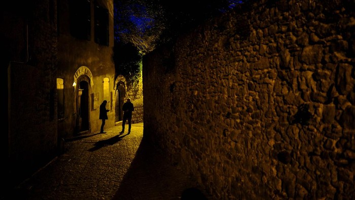 Tourists walk inside the Cite de Carcassonne, which is a medieval citadel city of Carcassonne, in the Occitania region, France February 28, 2024. REUTERS/Nacho Doce