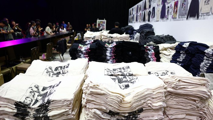 Taylor Swift merchandise t-shirts are seen at a soon-to-be-opened pop-up store ahead of her Eras Tour concert, at the Sands Expo and Convention Centre in Singapore February 28, 2024. REUTERS/Edgar Su