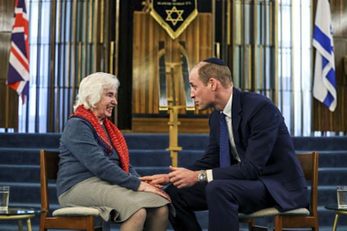 Rabbi Daniel Epstein shows Britains Prince William a 17th century Torah scroll as he visits the Western Marble Arch Synagogue, in London, Britain, Feb. 29, 2024. (Toby Melville/Pool photo via AP)