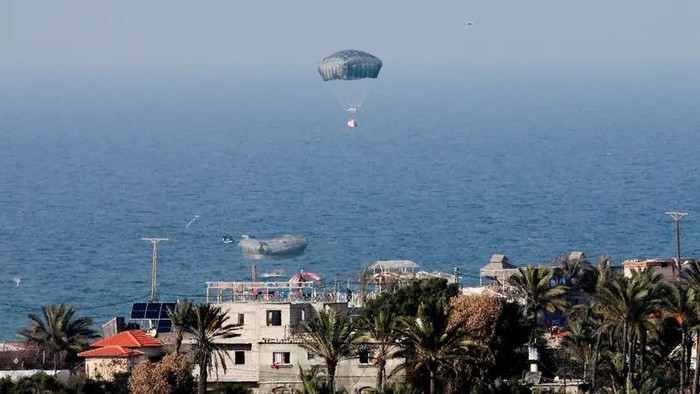 Aid is air-dropped over Gaza, amid the ongoing the conflict between Israel and Hamas, in Rafah in the southern Gaza Strip February 26, 2024. (Reuters)