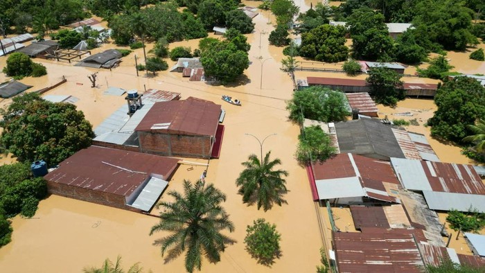 Foto Udara Banjir Bandang Terjang Bolivia Aerial view of houses and buildings submerged following flooding from heavy rain, causing the Acre River's bank to burst, in Cobija, Bolivia, in this still image released on February 27, 2024. Dr Papito Richter - Gobernador/Handout via REUTERS THIS IMAGE HAS BEEN SUPPLIED BY A THIRD PARTY. NO RESALES. NO ARCHIVES. MANDATORY CREDIT.