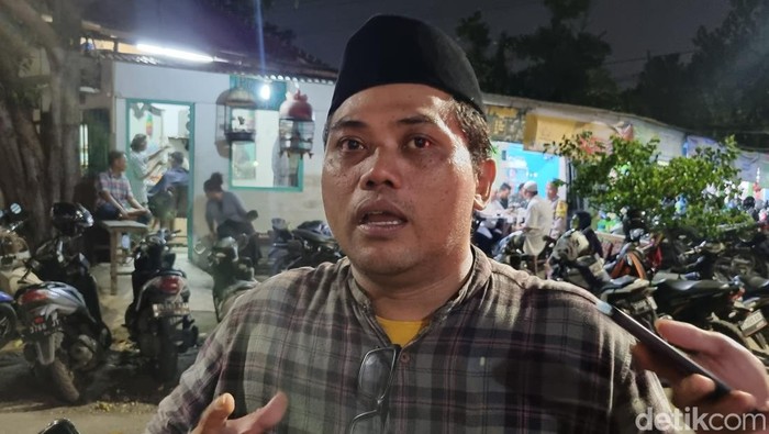 Ustaz Riza Basalamah dan Kepala Satuan Koordinasi Cabang Banser Kota Surabaya, Agustiya Deni Susandi