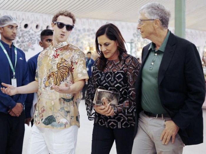 This photograph released by the Reliance group shows Mark Zuckerberg gesturing as he talks to Bill Gates, right, walking with Paula Hurd, center, at a pre-wedding bash of billionaire industrialist Mukesh Ambanis son Anant Ambani in Jamnagar, India, Saturday, Mar. 02, 2024.