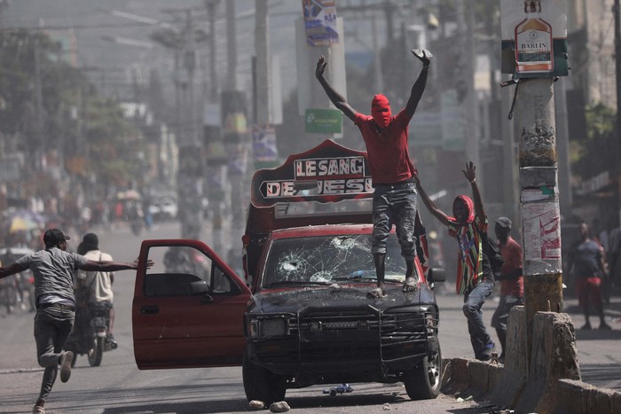 A view shows vehicles damaged by fire during a protest against Prime Minister Ariel Henrys government and insecurity, in Port-au-Prince, Haiti March 1, 2024. REUTERS/Ralph Tedy Erol