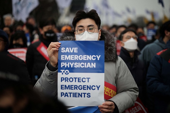 Doctors take part in a rally to protest against government plans to increase medical school admissions in Seoul, South Korea, March 3, 2024.   REUTERS/Kim Hong-Ji