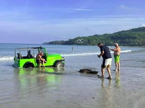 Lagi-lagi Turis China, Bawa Mobil ke Pantai Sampai Tenggelam