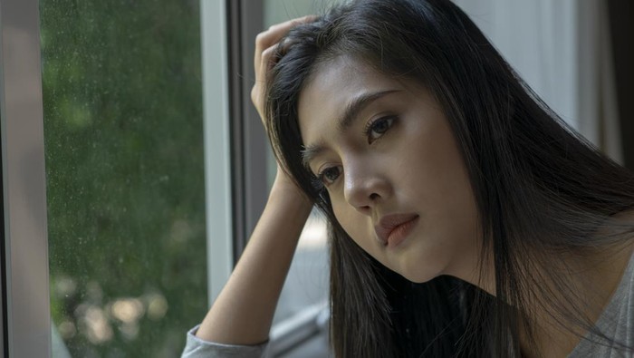 1477491876 Young Asian woman feeling sad tired and worried suffering depression in mental health, problems and broken heart concept.