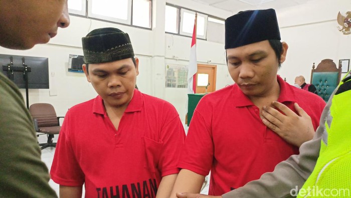 Ariansyah dan Arwandi usai agenda pembacaan pledoi kasus pembunuhan adik Bupati Muratara.